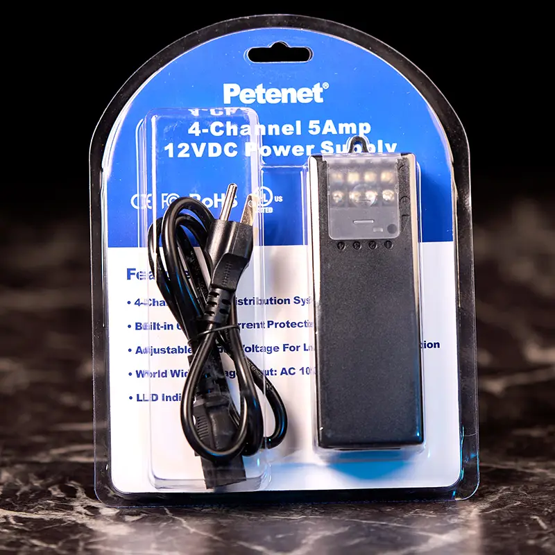 A package with a four channel power adapter inside including a power cable with three prongs, American plug type.
